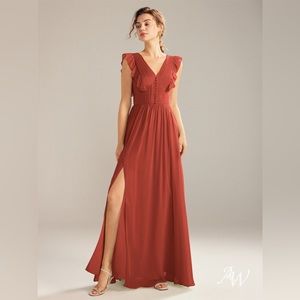 Rust chiffon bridesmaid dress.